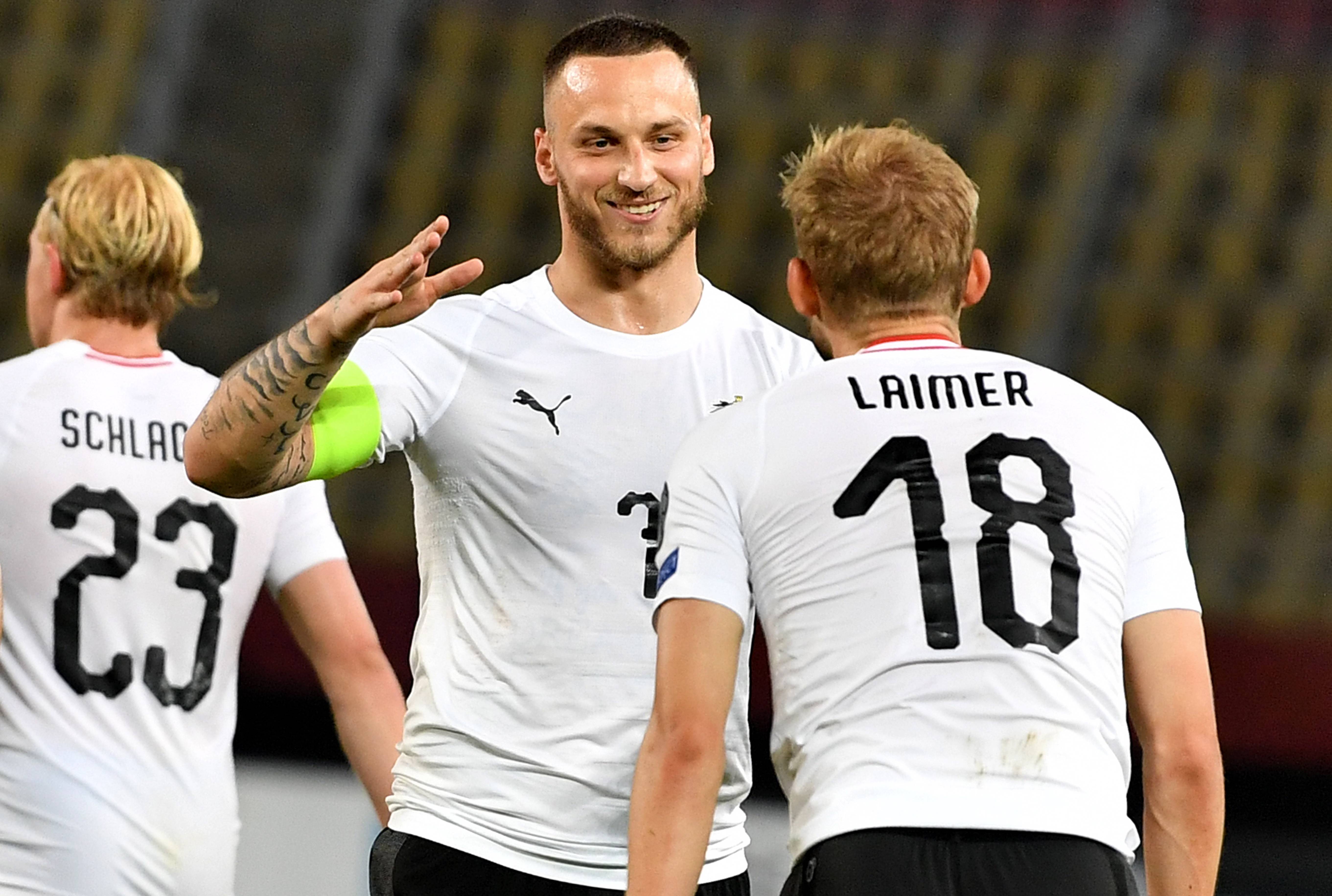 奥地利险胜加拿大，德国逆转阿根廷之战